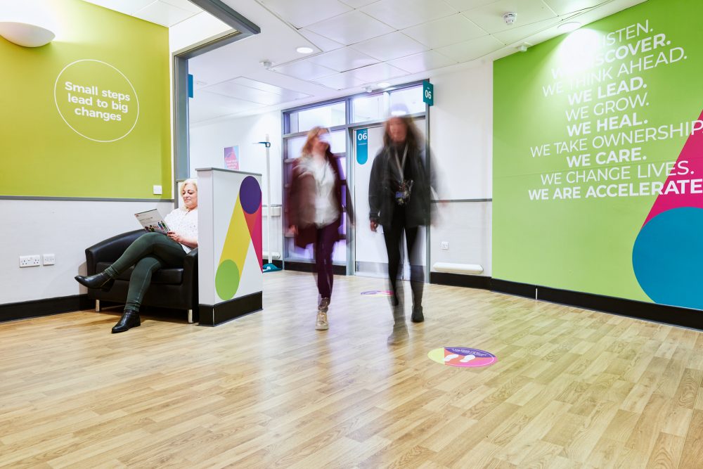 People walking in Accelerate corridor